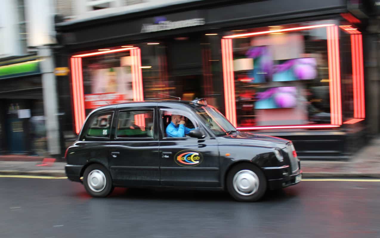 The black cab of London passing by
